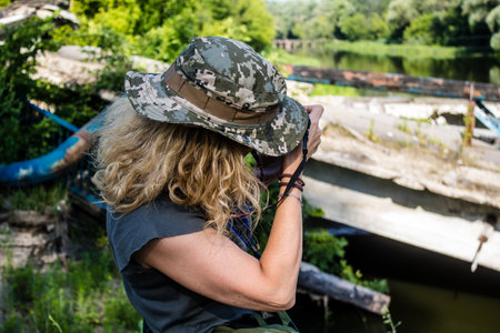 Donbass, Ukraine, July 06, 2024 Journalists at the frontline in the gray zone between Ukrainian and Russian armed forces. This buffer zone is dangerous and fighting rages in the region.のeditorial素材
