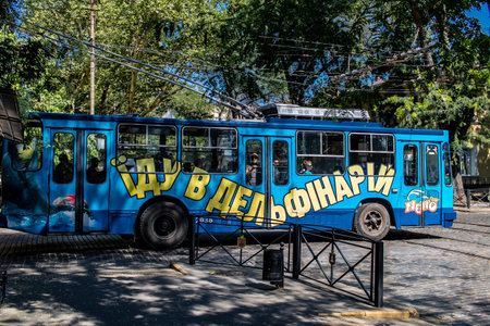 Odessa, Ukraine, July 17, 2024 Bus rolling on the streets of Odessa. Public services operate despite the attack on the city by Russian armed forces.のeditorial素材