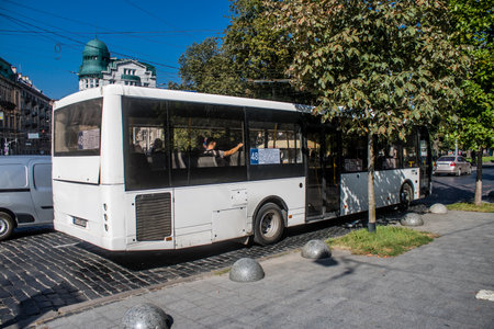 Lviv, Ukraine, August 29, 2024 Bus rolling on the streets of Lviv. Public services operate despite the war and attack on the city by Russian armed forces.の写真素材