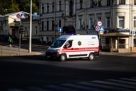 Kharkiv, Ukraine, September 12, 2024 Ambulance rolling downtown Kharkiv during the war with Russia, Kharkiv is the target of Russian missiles and sirens sound every dayの写真素材