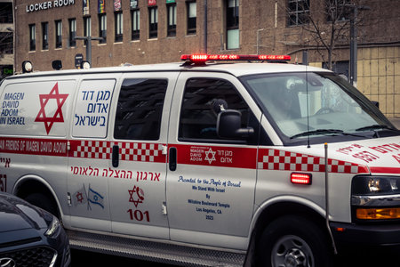Tel Aviv, Israel, March 13, 2026 An emergency ambulance driving through the city streets with sirens...