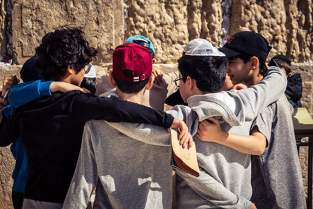 Jerusalem, Israel â€“ February 18, 2026. The new generation at the holy site. Young boys repeat...