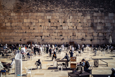 Jerusalem, Israel - February 18, 2026. Wide perspective of the Western Wall plaza showing the crowd...