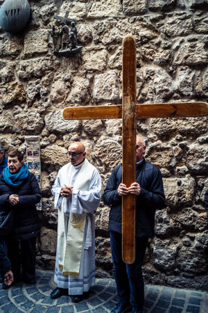 Jerusalem, Israel, 19 February 2026  Italian Christian pilgrims led by a priest conduct an official...
