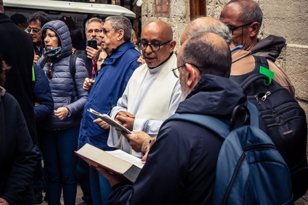 Jerusalem, Israel, 19 February 2026  Italian Christian pilgrims led by a priest conduct an official...