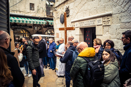 Jerusalem, Israel, 19 February 2026  Italian Christian pilgrims led by a priest conduct an official...