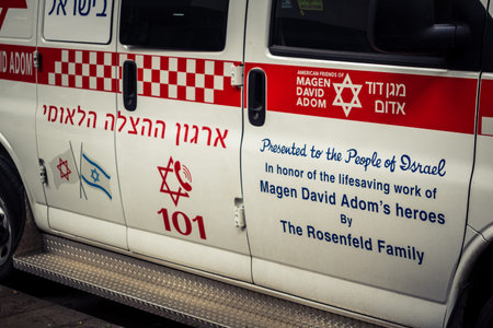 Tel Aviv, Israel, March 14, 2026 An ambulance is parked on a city street as a dense Sharav sandstorm...