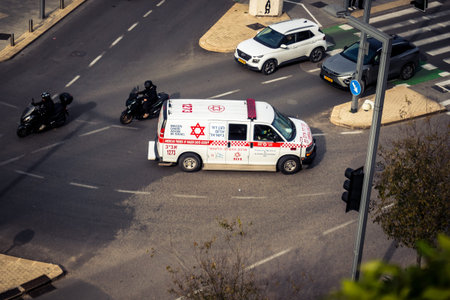 Tel Aviv, Israel, January 21, 2026 Magen David Adom (MDA) ambulance driving with emergency lights...