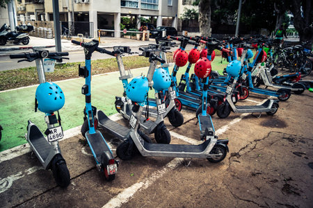 Tel Aviv, Israel, January 14, 2026 Parked electric scooters along the Rothschild BoulevardÂ a...
