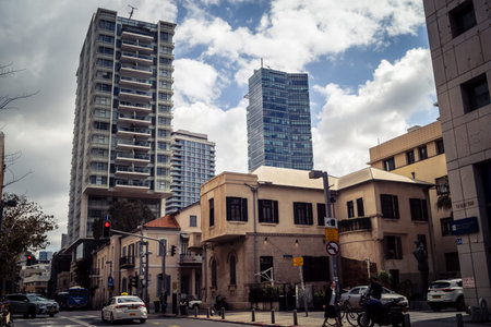 Tel Aviv, Israel, February 25 2026, modern residential building with balconies and urban...