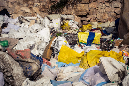 Hebron, West Bank, December 21, 2025 Piles of garbage and waste litter the streets of Hebron. The...