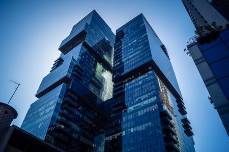 Tel Aviv, Israel, March 17, 2026 Architectural study of the geometric glass surfaces of the modern...