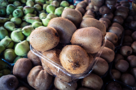 Hebron, West Bank, Palestine - February 12, 2026 Fresh fruits display for sale on a stall at the...