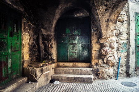Hebron, West Bank, December 19, 2025 Alleyways and stone arches in the Old City. The traditional...