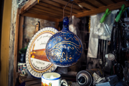 Hebron, Palestinian Territory, February 5, 2026 Local souvenir shop in the old city. Traditional handicrafts, ceramics, and cultural items displayed for visitors in the historic district of Hebron.のeditorial素材