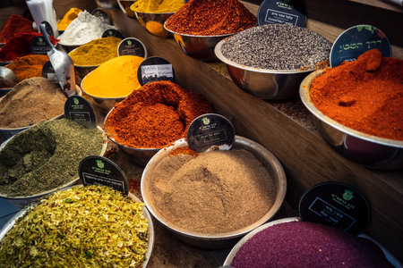 Jerusalem, Israel - February 17, 2026 Exploration of traditional spices at Mahane Yehuda Market, showcasing vibrant colors, exotic textures and culinary heritage in this iconic urban location.のeditorial素材