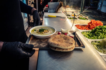 Jerusalem, Israel - February 17, 2026 The art of trade at Mahane Yehuda, showcasing merchants in...