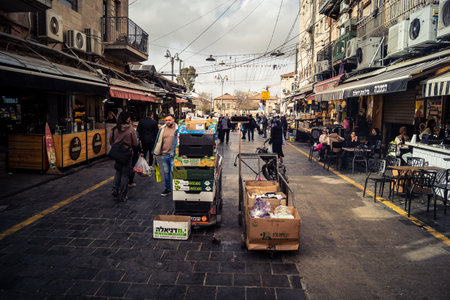 Jerusalem, Israel - February 17, 2026 A stroll through the historic alleys of Mahane Yehuda, showcasing the vibrant soul, busy streets and urban architecture of this iconic and authentic location.のeditorial素材