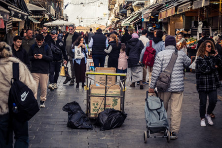 Jerusalem, Israel - February 17, 2026 Life and movement in Mahane Yehuda, showcasing the local crowd, diverse characters and the vibrant urban energy within this iconic and authentic location.のeditorial素材