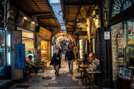 Jerusalem, Israel, December 13, 2025 Busy alleyways and atmospheric plays of light in the Christian...