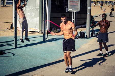 Tel Aviv, Israel, January 3, 2026 People engage in various leisure activities on the beach, the beach remains a vital sanctuary for physical activity and mental escape for the residents of Tel Aviv.のeditorial素材