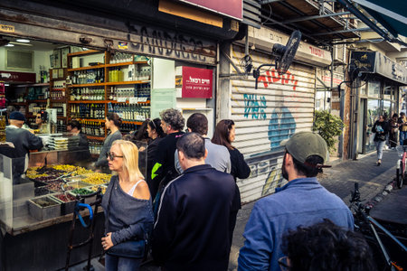 Tel Aviv, Israel, January 16, 2026 People in a vibrant daily scene at the heart of the famous...