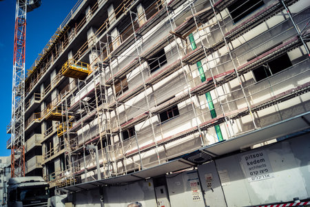 Tel Aviv, Israel, February 26 2026, Modern building under construction, raw concrete and steel...