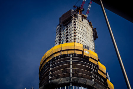 Tel Aviv, Israel, March 6, 2026 Ground view of a high-rise residential building under construction...