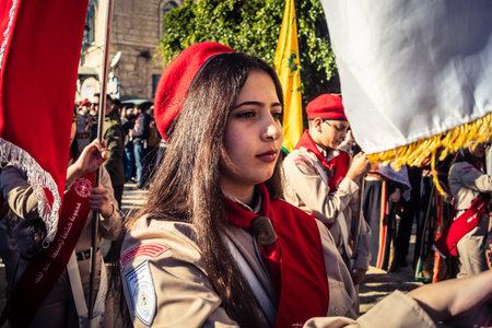 Bethlehem, West Bank, December 24, 2025 Close-up of a young Palestinian scout during the annual...