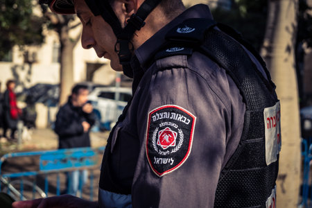 Tel Aviv, Israel, March 1, 2026 Firefighters and emergency crews operating at a missile impact site...