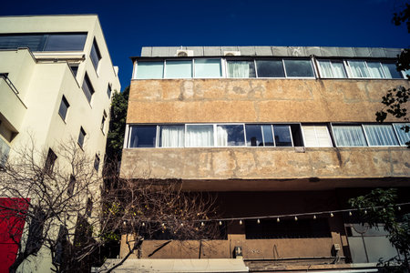 Tel Aviv, Israel, February 26 2026, Sheinkin Street View, rhythmic Bauhaus geometry, shadow...