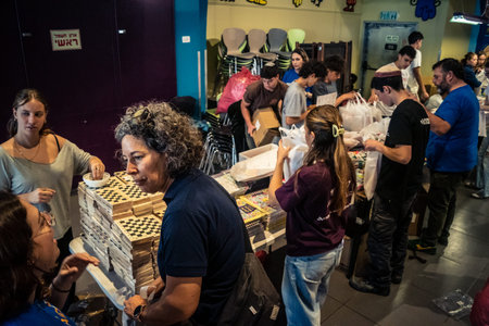 Tel Aviv, Israel,Â  March 5, 2026 Groups of young Israeli volunteers assemble and pack...
