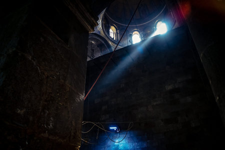 JERUSALEM, ISRAEL - FEBRUARY 21, 2026 Divine natural sunlight beam piercing the darkness from the...