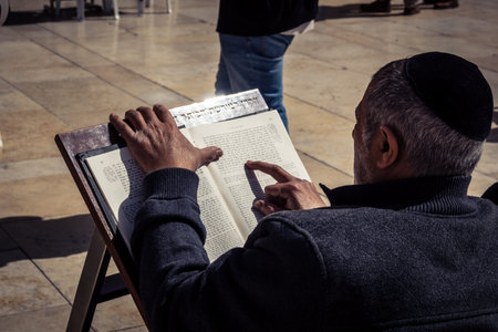 Jerusalem, Israel - February 18, 2026. Close-up of Jewish men absorbed in studying the Torah or...
