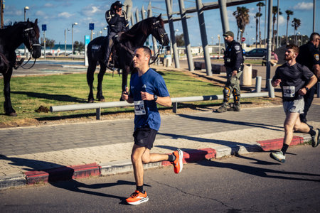 Tel Aviv, Israel, February 27, 2026 Large crowd of runners competing in the streets during the...