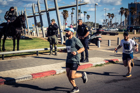 Tel Aviv, Israel, February 27, 2026 Large crowd of runners competing in the streets during the...