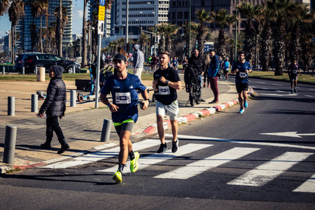 Tel Aviv, Israel, February 27, 2026 Large crowd of runners competing in the streets during the...