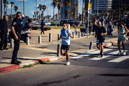Tel Aviv, Israel, February 27, 2026 Large crowd of runners competing in the streets during the...