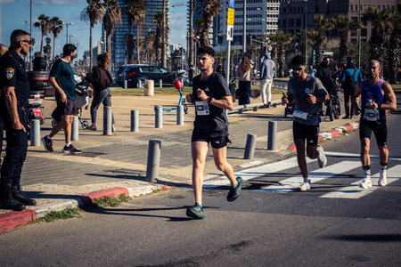 Tel Aviv, Israel, February 27, 2026 Large crowd of runners competing in the streets during the...