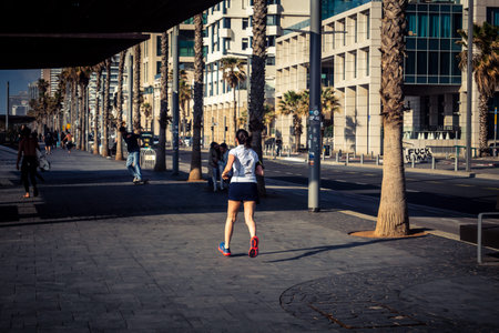 Tel Aviv, Israel, â€‹March 16, 2026 Local residents and international tourists enjoy a walk...