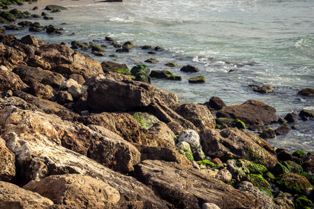 Tel Aviv, Israel, âMarch 16, 2026 A view of the Mediterranean Sea shoreline with waves breaking against the coastal rocks. The scene illustrates the natural beauty of the Tel Aviv coast, situated just steps away from urban infrastructure and public safeのeditorial素材
