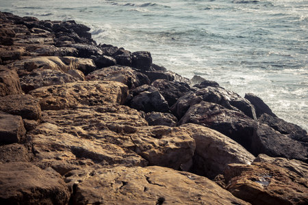 Tel Aviv, Israel, âMarch 16, 2026 A view of the Mediterranean Sea shoreline with waves breaking against the coastal rocks. The scene illustrates the natural beauty of the Tel Aviv coast, situated just steps away from urban infrastructure and public safeのeditorial素材