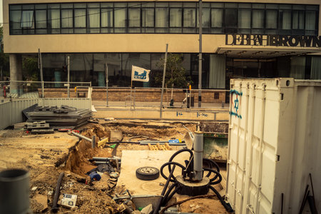 Tel Aviv, Israel, March 14, 2026 Construction equipment for the new tramway stands motionless during...