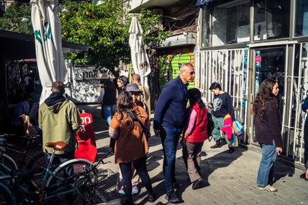 Tel Aviv, Israel, March 22, 2026 People rushing into a public bomb shelter or miklat and waiting inside during an air raid siren in the Florentin neighborhood while seeking protection during a missile attack.のeditorial素材