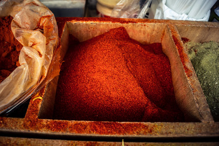 Hebron, West Bank, Palestine, March 25, 2026 Inside a traditional and bustling Palestinian grocery store specialized in bulk spices, dried fruits, and nuts in the heart of the historic old city of Hebron. The market stall is a sensory oasis, displaying doのeditorial素材