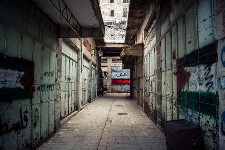 Hebron, West Bank, Palestine, March 25, 2026 Inside the historic Old City souk of Hebron, look up to...