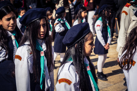 Bethlehem, West Bank, December 24, 2025 Young Palestinian scouts march in formation in the streets...