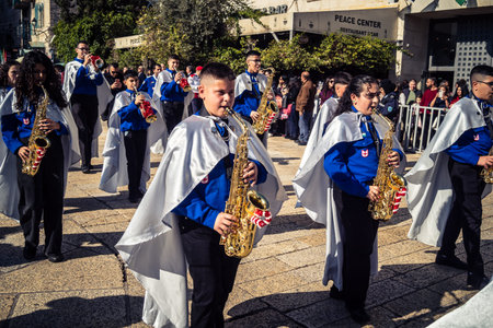 Bethlehem, West Bank, December 24, 2025 Palestinian scout marching band performs during the...