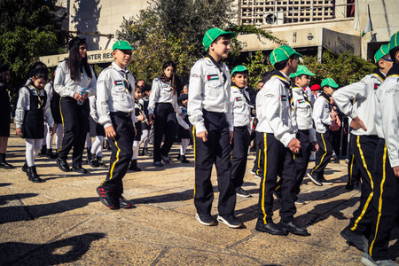 Bethlehem, West Bank, December 24, 2025 Young Palestinian scouts march in formation in the streets...