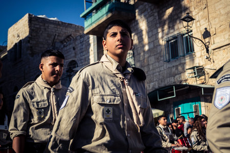 Bethlehem, West Bank, December 24, 2025 Close-up of a young Palestinian scout during the annual...